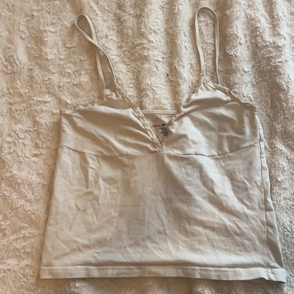 Brandy Melville Tops - Women’s Brandy Melville / John Galt cream colored tank top with ruffled trim.